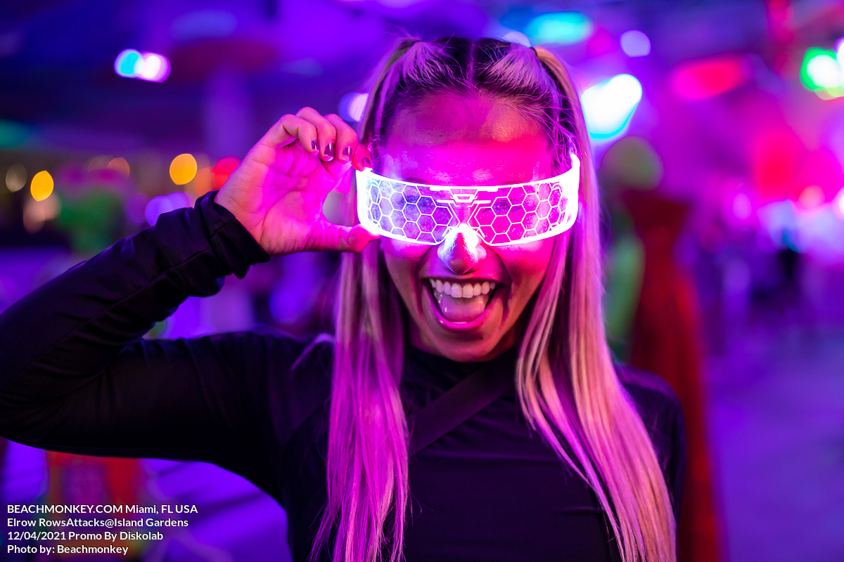 hot girl with glowing glasses Music Festival Photographer at Island Gardens for Elrow RowsAttacks promoted by Diskolab in Miami, FL USA on December 4, 2021 by Miami photographer Beachmonkey