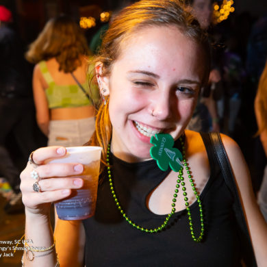 hot girl drinking at Tongys Shmackhouse for St Patricks Day on march 17 2022 in Conway, SC USA photos ﻿Separator ﻿ by Myrtle Beach photographer Beachmonkey