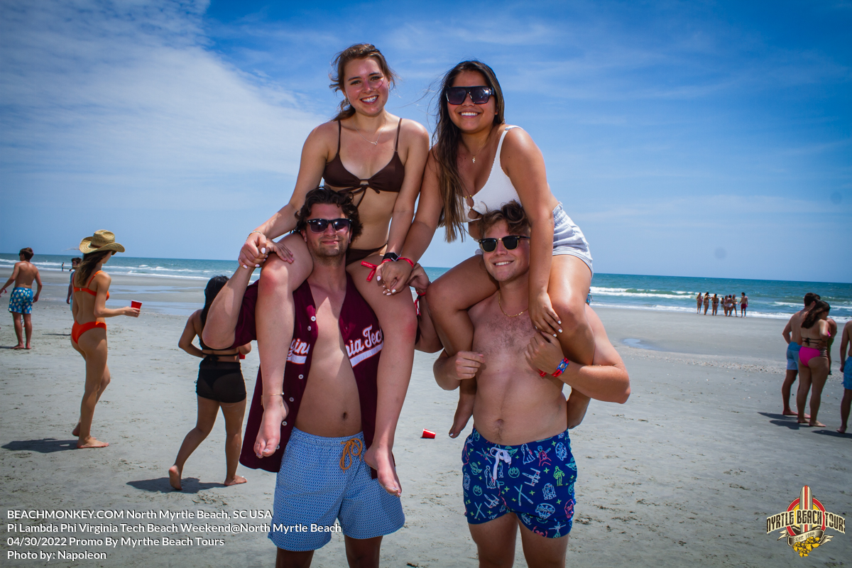 two girls on guys shoulders Pi Lambda Phi Virginia Tech Fraternity Beach Weekend in North Myrtle Beach, SC USA sponsored by Myrtlebeachtours.com April 30th 2022 Photos by Napoleon