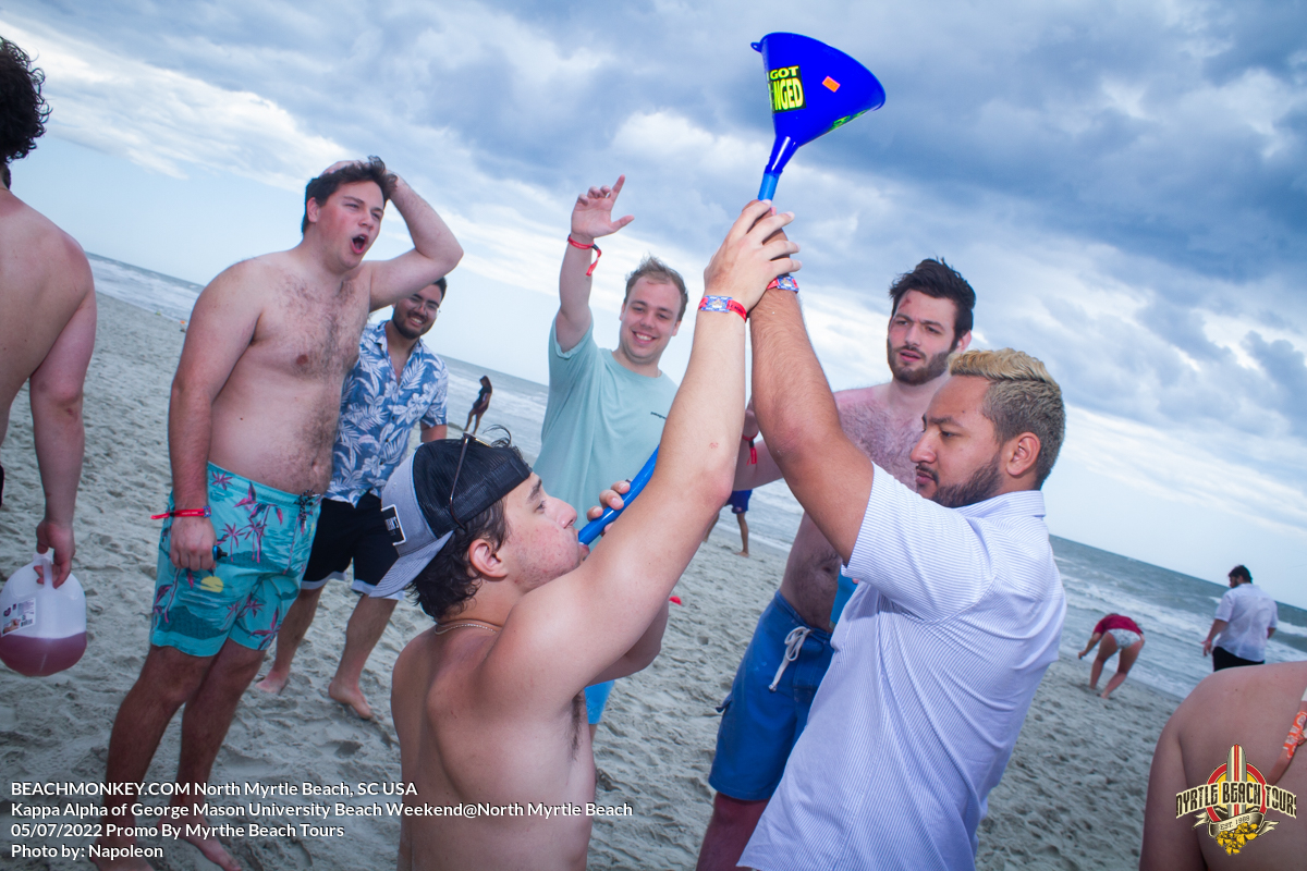 having fun with a funnel Kappa Alpha of George Mason University Beach Weekend North Myrtle Beach, SC USA sponsored by Myrtlebeachtours.com may 9th 2022  Photos by Napoleon