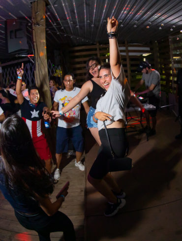 girl dancing at College international night at sharkeys in Myrtle Beach, SC Photos by Myrtle Beach photographer Beachmonkey on June 6th, 2022