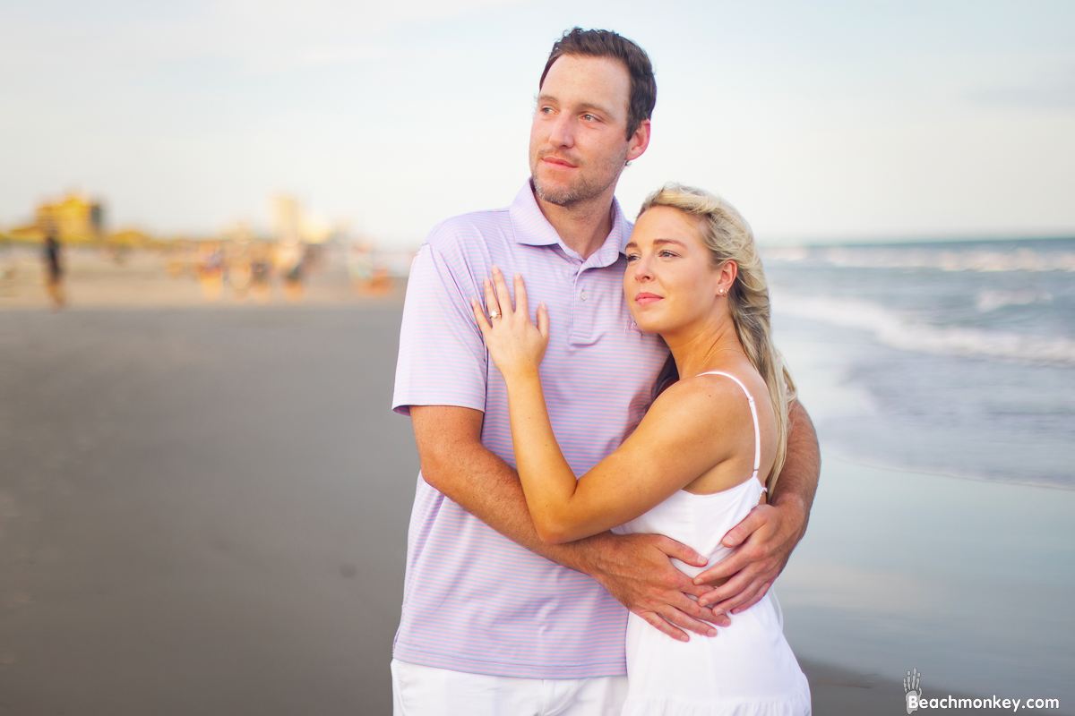 Happy newly engaged couple in North Myrtle Beach july 2022 Photo by Beachmonkey photography