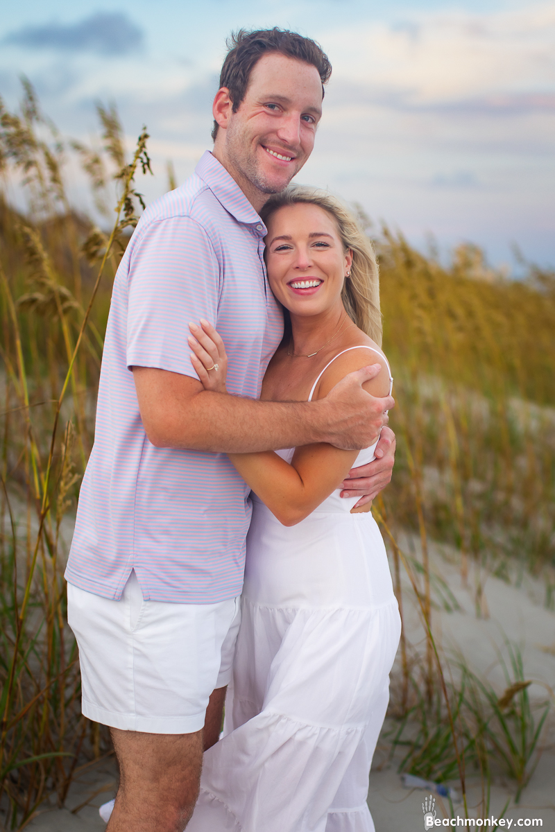 Happy newly engaged couple in North Myrtle Beach july 2022 Photo by Beachmonkey photography