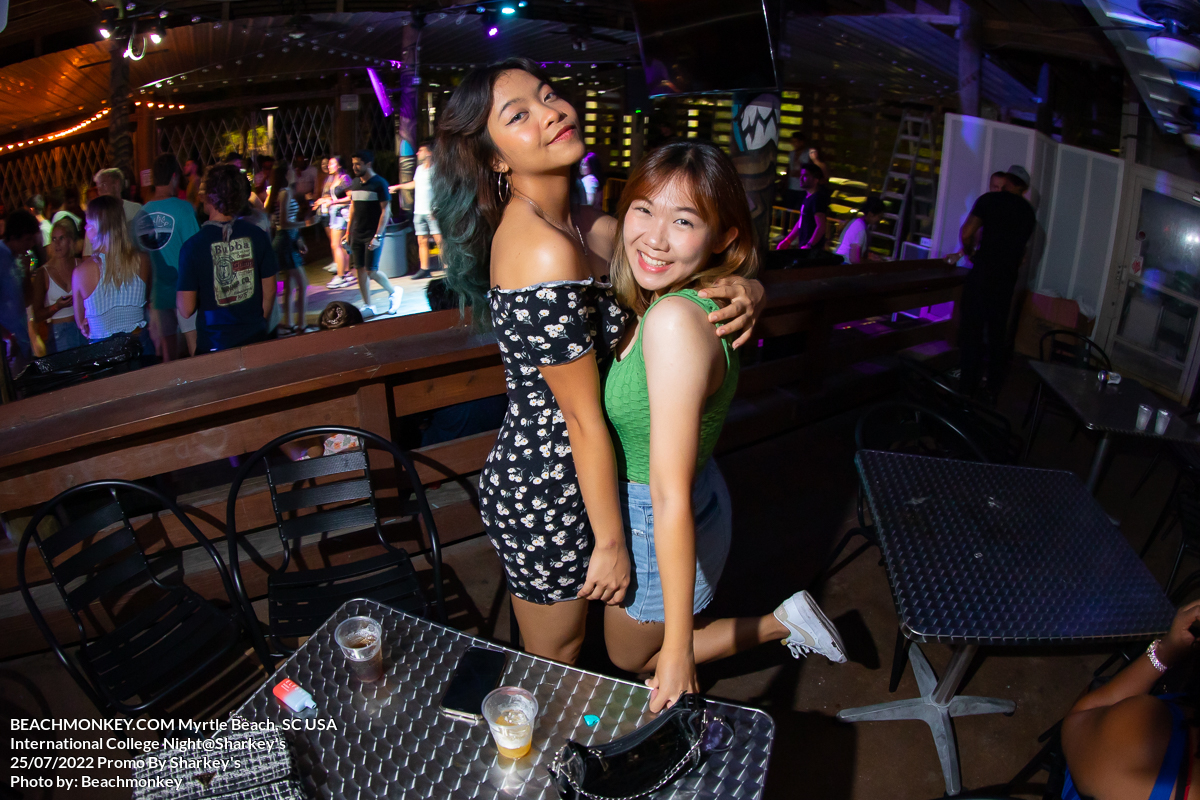 girls hugging at sharkeys bar in Myrtle Beach, SC on international college night in July 25 2022