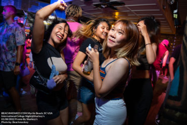 Girls dancing at the Sharkeys for College International Night August 2nd 2022 Myrtle Beach, SC USA photo by Beachmonkey a myrtle beach nightlife photographer