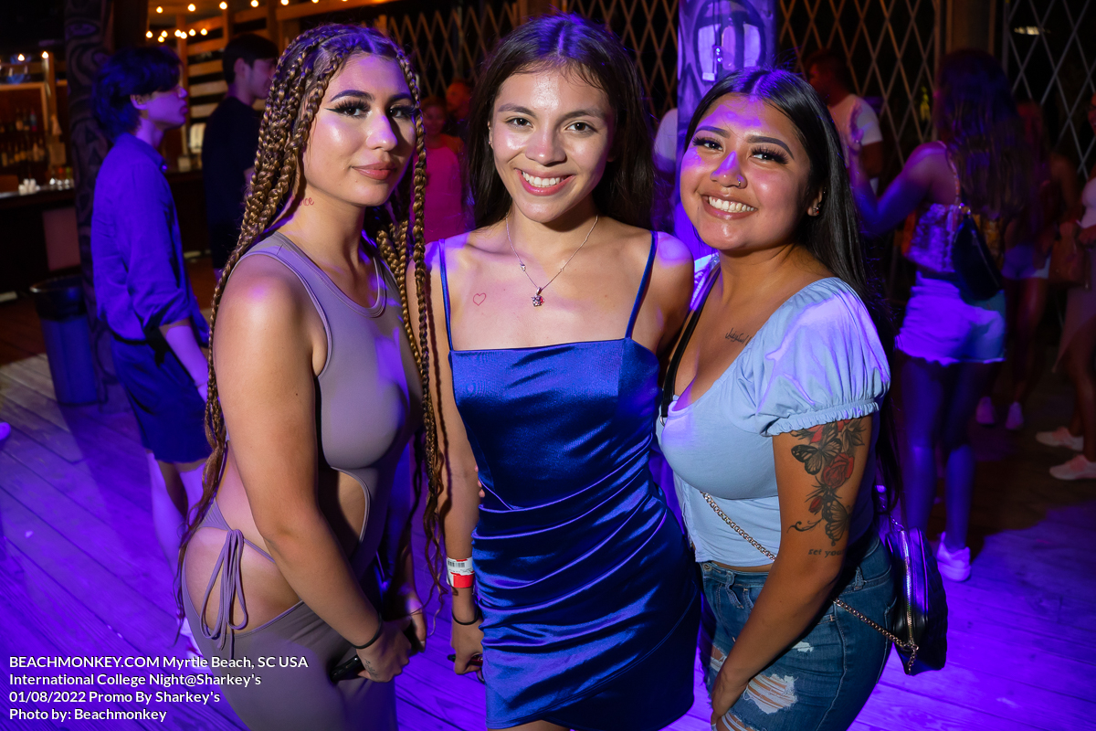 3 girls hanging out at the Sharkeys for College International Night August 2nd 2022 Myrtle Beach, SC USA photo by Beachmonkey a myrtle beach nightlife photographer