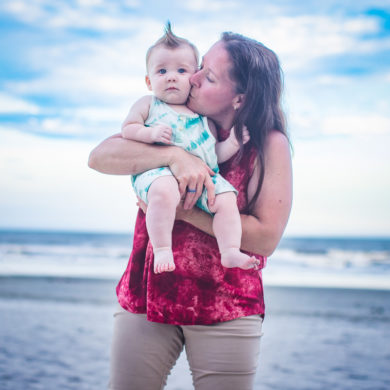 grandma and baby A family Beach photo shoot in North Myrtle Beach, SC with Alisha's family by Beachmonkey of beachmonkey photography, a family photographer on July 19th 2022