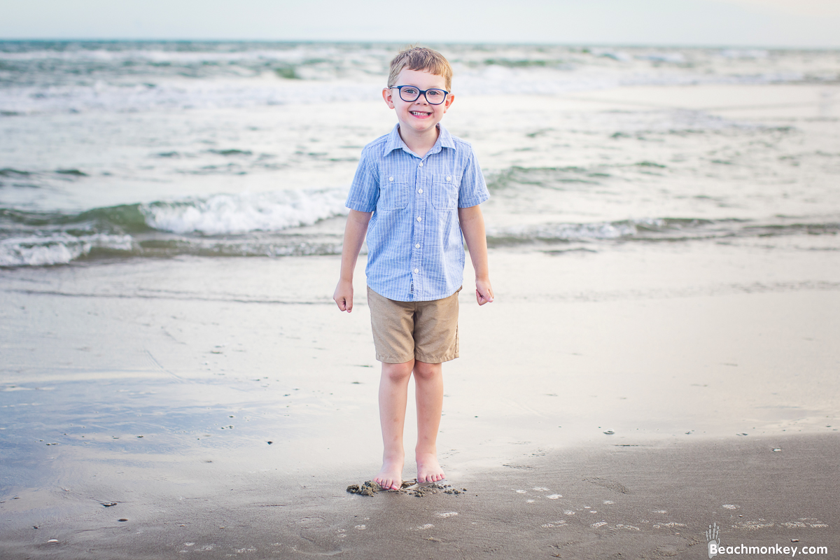 small boy shot A family Beach photo shoot in North Myrtle Beach, SC with Ashlie's family by Beachmonkey of beachmonkey photography, a family photographer on August 4th 2022