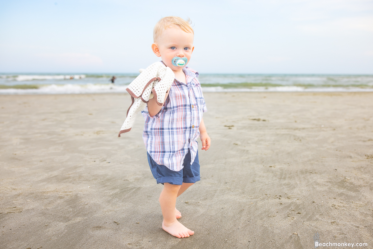 blue eyed baby boy A family Beach photo shoot in North Myrtle Beach, SC with Bob's family by Beachmonkey of beachmonkey photography, a family photographer August 2022
