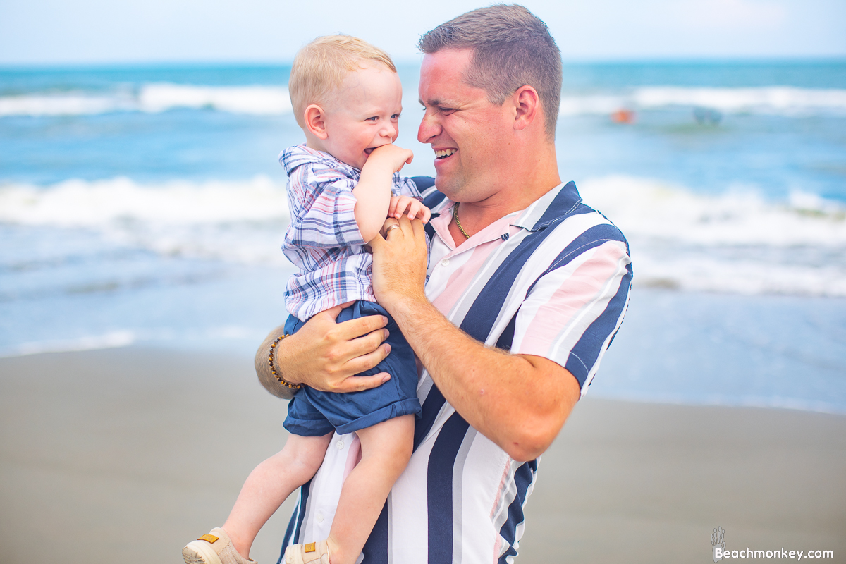 Uncle with nephew A family Beach photo shoot in North Myrtle Beach, SC with Bob's family by Beachmonkey of beachmonkey photography, a family photographer August 2022
