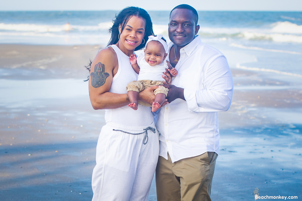 Parents and baby A family Beach photo shoot in Myrtle Beach, SC with Jasmine's family by Beachmonkey of beachmonkey photography, a family photographer on July 21st 2022