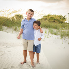 two brothers at A family Beach photo shoot in Myrtle Beach, SC USA with Kerry's family by Slava of beachmonkey photography, a family photographer on July 18th 2022