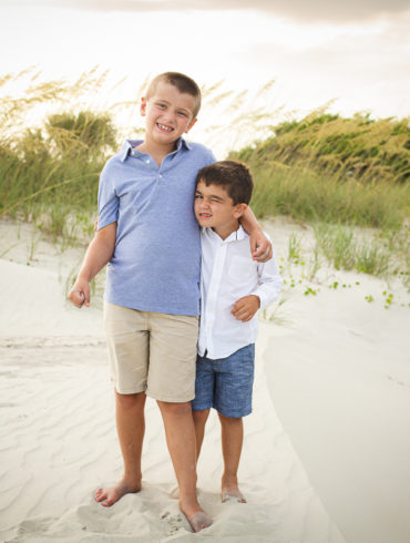 two brothers at A family Beach photo shoot in Myrtle Beach, SC USA with Kerry's family by Slava of beachmonkey photography, a family photographer on July 18th 2022