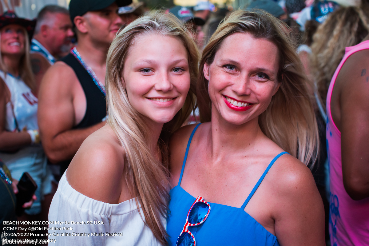 two very pretty women at Carolina Country Music Festival Day Four June 12th, 2022 in Myrtle Beach, SC USA photos by Myrtle Beach photographer Beachmonkey