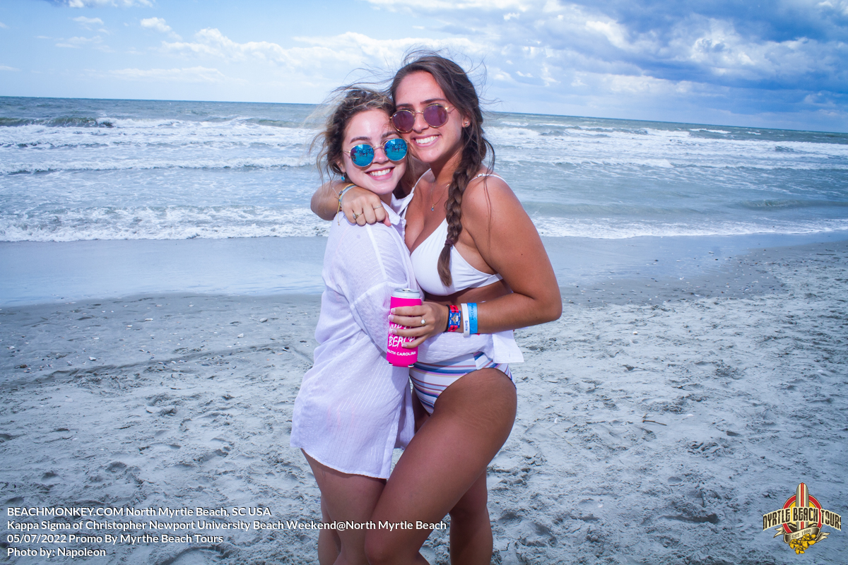 two sorority girls at the Phi Gamma Delta of Christopher Newport University Beach Weekend in North Myrtle Beach, SC USA sponsored by Myrtlebeachtours.com May 9 2022 Photos by Napoleon