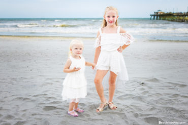 a family beach photoshoot at cherry grove pier in north Myrtle beach SC by Myrtle Beach photographer Beachmonkey