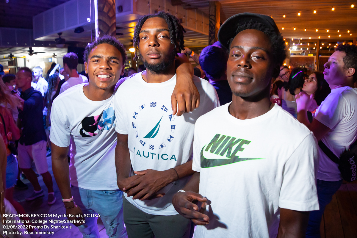 3 guys hanging out at the Sharkeys for College International Night August 2nd 2022 Myrtle Beach, SC USA photo by Beachmonkey a myrtle beach nightlife photographer