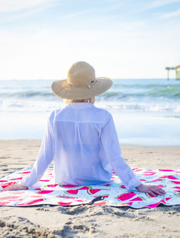 girl on watermelon towel watching waves A Branding and Lifestyle photo shoot in Myrtle Beach, SC with Solem Towel by Beachmonkey of beachmonkey photography, a Myrtle Beach photographer, Aug 14th 2022