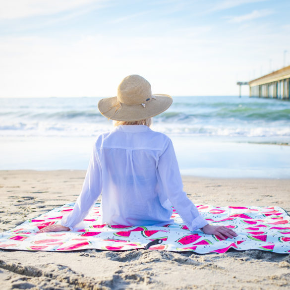 girl on watermelon towel watching waves A Branding and Lifestyle photo shoot in Myrtle Beach, SC with Solem Towel by Beachmonkey of beachmonkey photography, a Myrtle Beach photographer, Aug 14th 2022