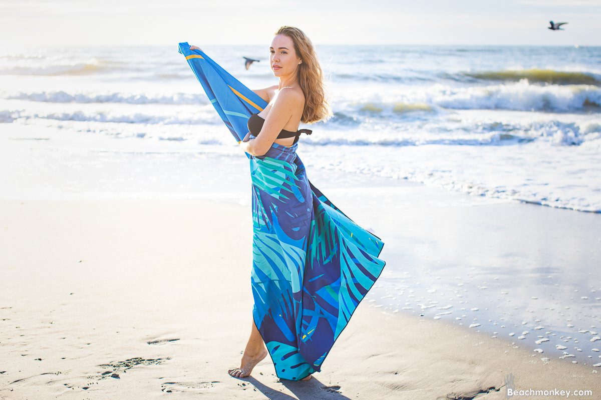 girl wrapping herself in a blanket A Branding and Lifestyle photo shoot in Myrtle Beach, SC with Solem Towel by Beachmonkey of beachmonkey photography, a Myrtle Beach photographer, Aug 14th 2022