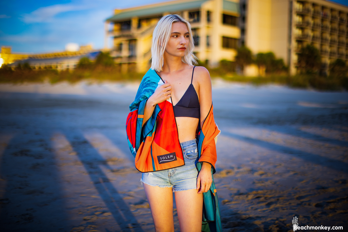 girl looking at sunrise A Branding and Lifestyle photo shoot in Myrtle Beach, SC with Solem Towel by Beachmonkey of beachmonkey photography, a Myrtle Beach photographer, Aug 14th 2022