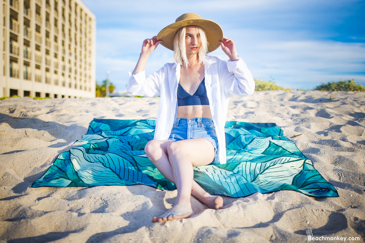 girl adjusting hat A Branding and Lifestyle photo shoot in Myrtle Beach, SC with Solem Towel by Beachmonkey of beachmonkey photography, a Myrtle Beach photographer, Aug 14th 2022