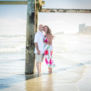 A Couples Beach photo shoot in North Myrtle Beach, SC with Melissa's family by Slava of beachmonkey photography, a couples photographer on July 17th 2022