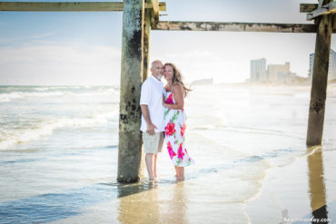 A Couples Beach photo shoot in North Myrtle Beach, SC with Melissa's family by Slava of beachmonkey photography, a couples photographer on July 17th 2022