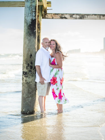 A Couples Beach photo shoot in North Myrtle Beach, SC with Melissa's family by Slava of beachmonkey photography, a couples photographer on July 17th 2022