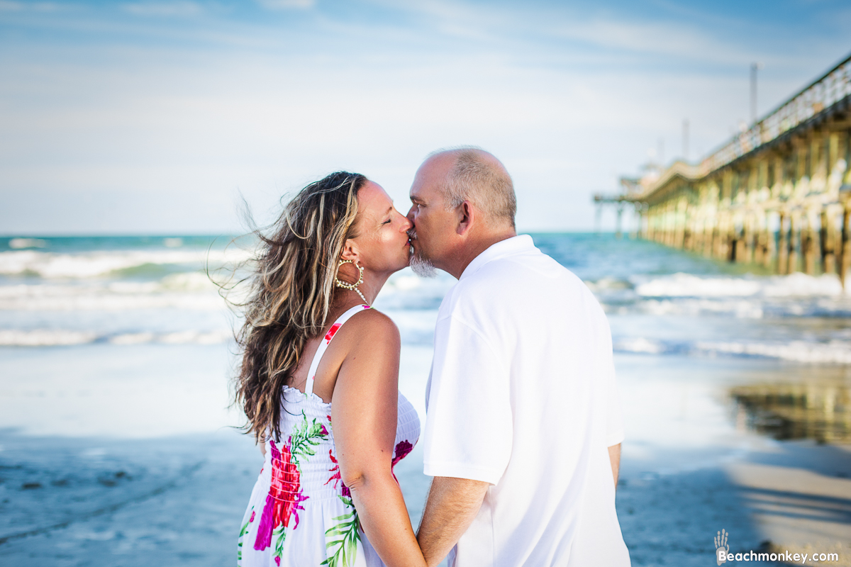 A Couples Beach photo shoot in North Myrtle Beach, SC with Melissa's family by Slava of beachmonkey photography, a couples photographer on July 17th 2022