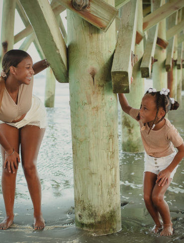 girls looking at each other A family Beach photo shoot in Myrtle Beach, SC USA with Sorangles family by Slava of beachmonkey photography, a family photographer on August 10th 2022