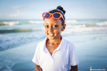 happy daughter A family Beach photo shoot in Myrtle Beach, SC USA with Tesfa's family by Slava of beachmonkey photography, a family photographer on August 9th 2022