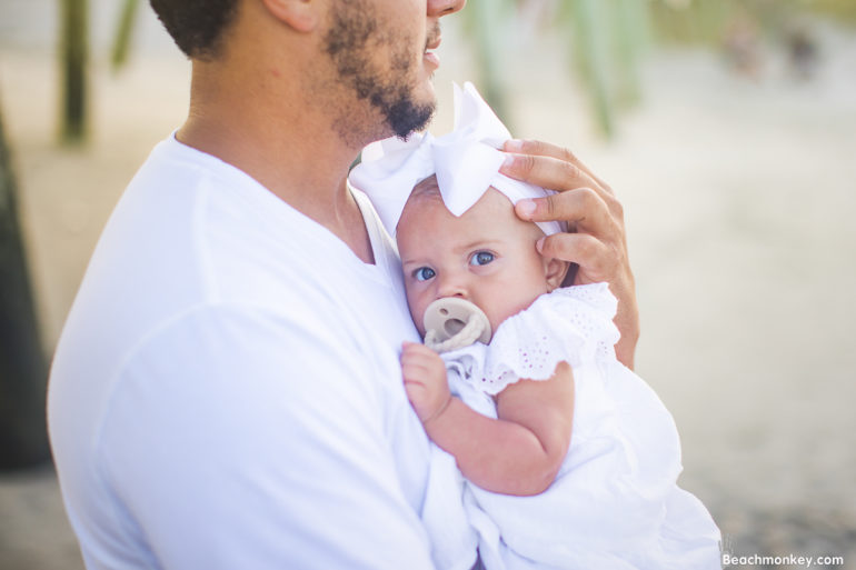 Father and baby daughter A family Beach photo shoot in Myrtle Beach, SC with Cassies's family by Beachmonkey of beachmonkey photography, a family photographer on July 16th 2022