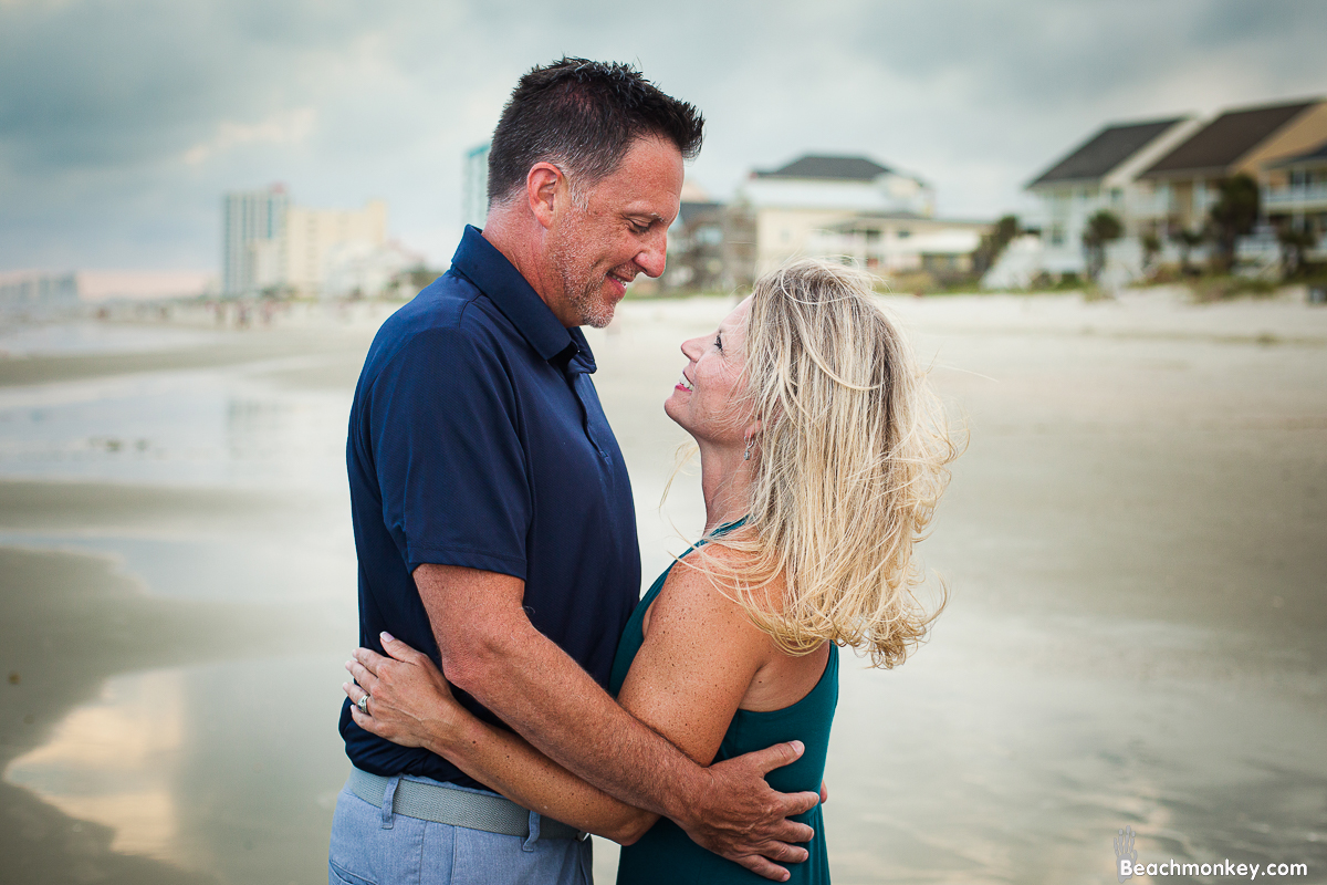 romantic couple A family Beach photo shoot in North Myrtle Beach, SC with Dana's family by Slava of beachmonkey photography, a family photographer on July 7th 2022