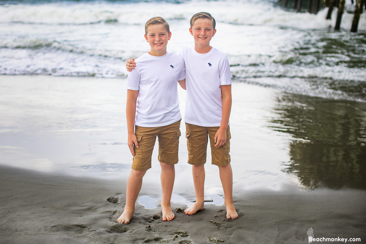 A family photo shoot in Garden City, SC Pier on July 14th, 2022 with Kally's family by Beachmonkey of beachmonkey photography, a family photographer