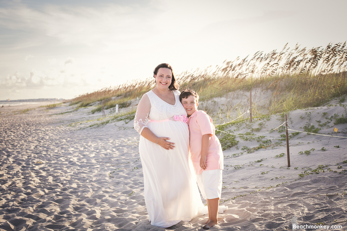 mother, son and future daughter A maternity Beach photo shoot in Myrtle Beach, SC USA with Zlata's family by Slava of beachmonkey photography, a maternity photographer on September 4th 2022