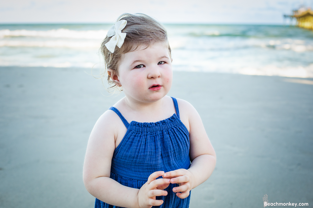 baby girl A family Beach photo shoot in North Myrtle Beach, SC with Erin's family by Slava of beachmonkey photography, a family photographer on August 8th 2022