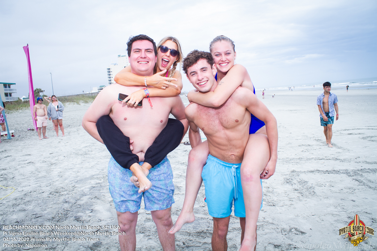riding piggy back at Pi Sigma Epsilon Fraternity Beach Weekend in North Myrtle Beach, SC USA sponsored by Myrtlebeachtours.com April 16th 2022 Photos by Napoleon