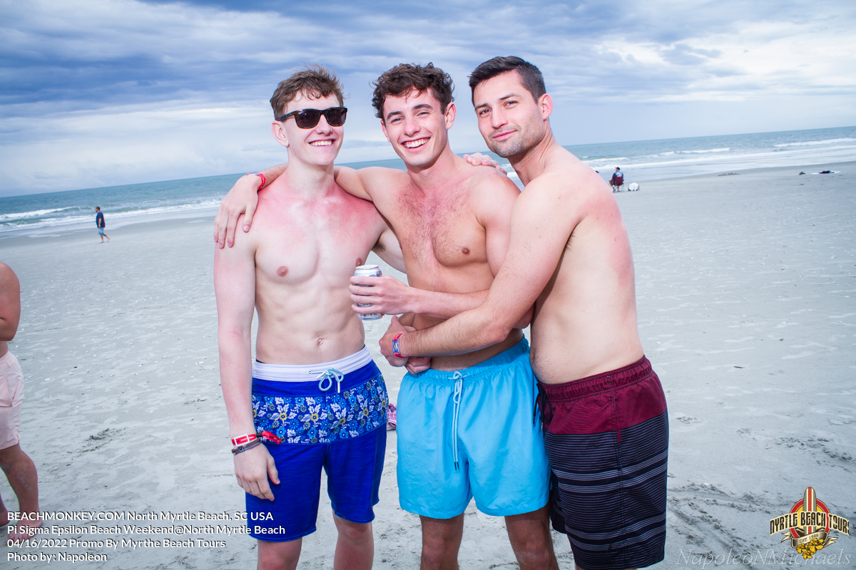 Three guys at Pi Sigma Epsilon Fraternity Beach Weekend in North Myrtle Beach, SC USA sponsored by Myrtlebeachtours.com April 16th 2022 Photos by Napoleon
