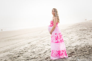 beautiful pregnant woman A family Beach photo shoot in North Myrtle Beach, SC with Sarah's family ﻿Separator ﻿ by Slava of beachmonkey photography, a family photographer on April 6th 2022