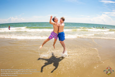 Two guys jumping into each other Theta Tau of University of South Carolina Weekend in North Myrtle Beach, SC USA sponsored by Myrtlebeachtours.com September 3rd 2022 Photos by Beachmonkey
