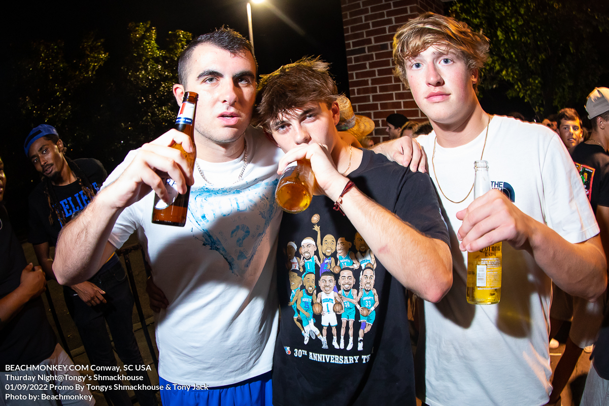 three guys drinking beer at Tongys Shmackhouse for Thursday night on Sept 1st 2022 in Conway, SC USA photos  by Myrtle Beach photographer Beachmonkey
