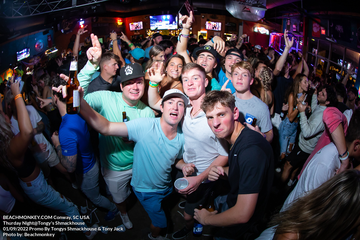group of bros raging on the dance floor at Tongys Shmackhouse for Thursday night on Sept 1st 2022 in Conway, SC USA photos  by Myrtle Beach photographer Beachmonkey