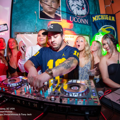 DJ Tony Jack surrounded by hot girls at Tongy's Shmackhouse for Thurday Nights September 1st 2022 in Conway, SC USA photos ﻿Separator ﻿ by Myrtle Beach photographer Beachmonkey