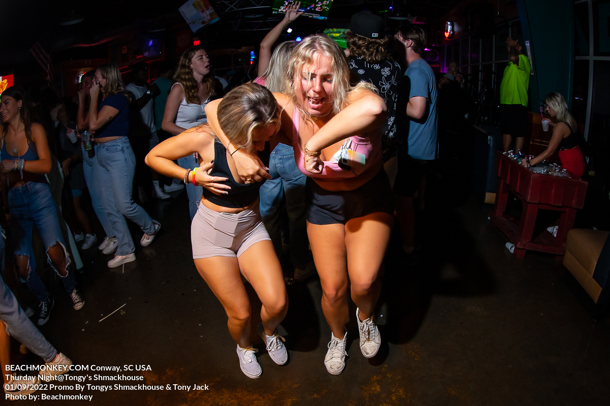 two girls raging at Tongys Shmackhouse for Thursday night on Sept 1st 2022 in Conway, SC USA photos  by Myrtle Beach photographer Beachmonkey