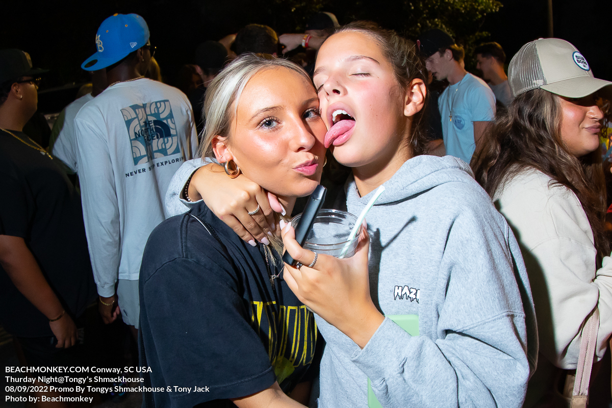 girl licking other girls face at Tongys Shmackhouse for Thursday night on Sept 8th 2022 in Conway, SC USA photos by Myrtle Beach photographer Beachmonkey