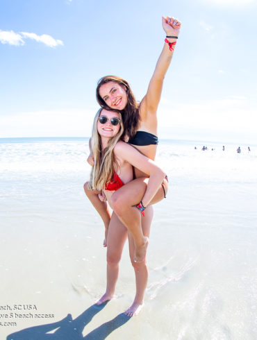 hot sorority girl in bikini riding piggy back Beta Theta Pi U of Louisville in North Myrtle Beach, SC USA sponsored by Myrtlebeachtours.com October 1st, 2022 Photos by Myrtle Beach photographer Beachmonkey